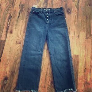 Levi’s black rib cage jeans.